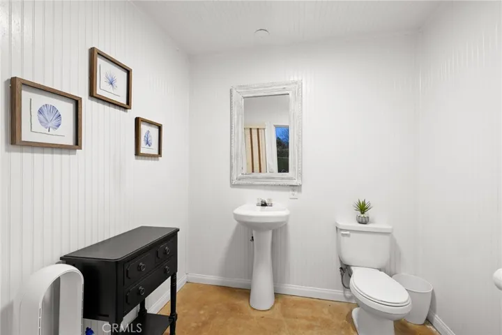 Detached half bathroom.