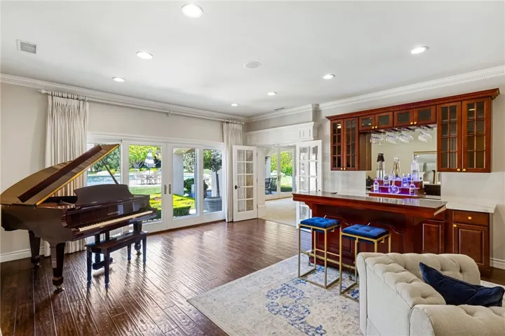 Close up of the bar and French doors that open to the family room.