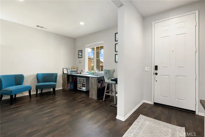 Main floor office/flex space/potential 6th bedroom and access to the front door