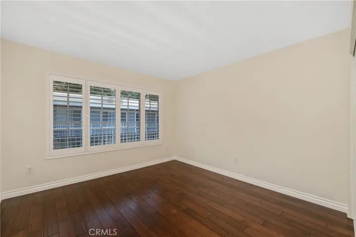 3rd Bedroom w/Shutters and Courtyard Views