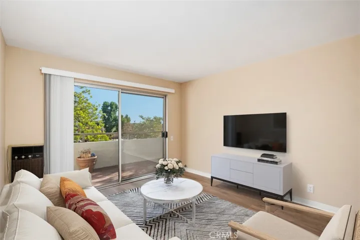 Living room that has been virtually staged for you to get an idea of the layout of the room
