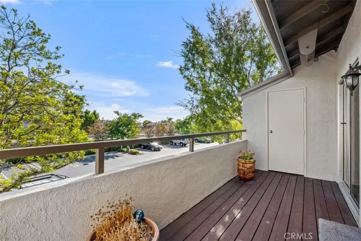 Unit K-178 Balcony picture facing west and nice to sit on your deck and see the tree tops and other lush greenery
