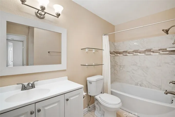 Bathroom has been updated and looks very open and clean.