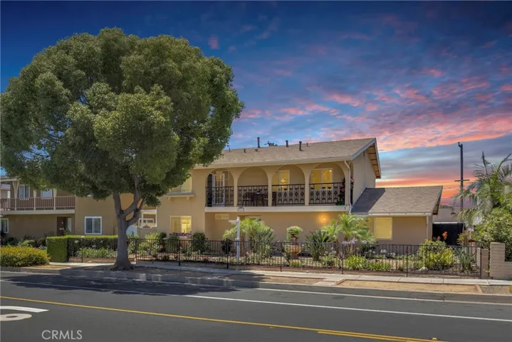 TWILIGHT VIEW OF FRONT OF HOME