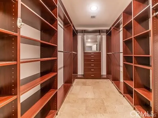 Primary bedroom’s walk in closet