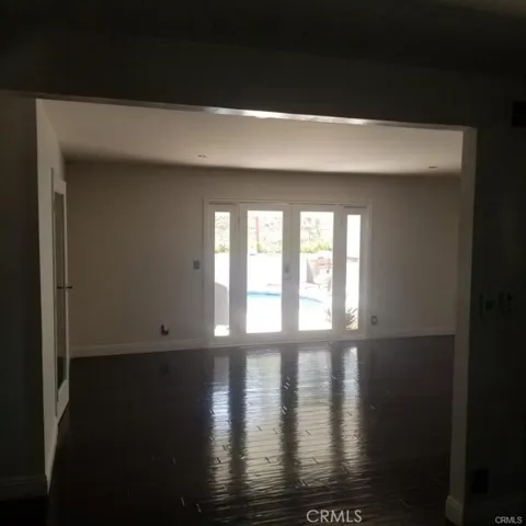 The is beautiful rich Enginerred wood flooring throughout most of the home