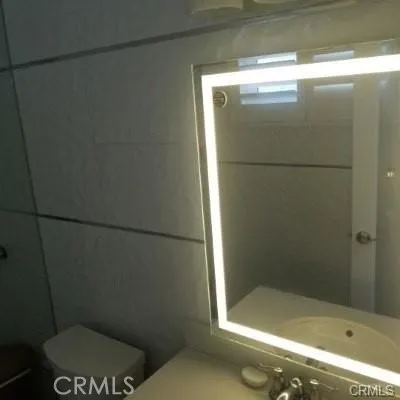 Here is a view of the lighted mirror in the primary bathroom