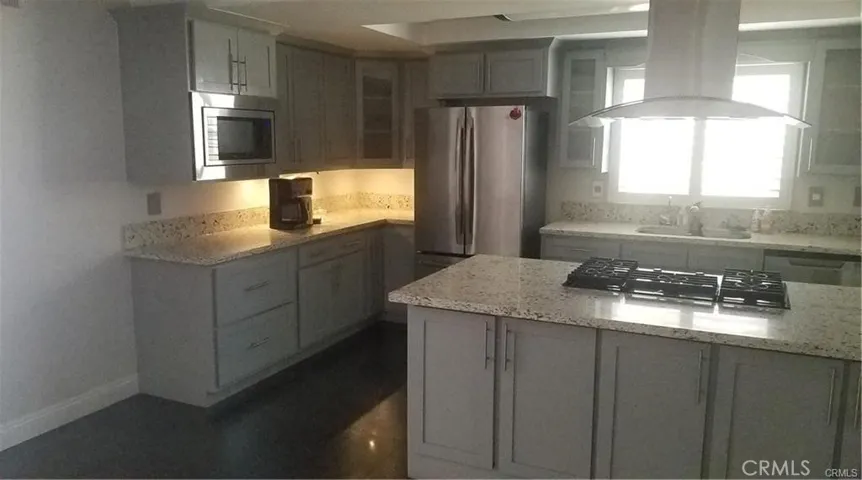 This remodeled kitchen comes with the refrigerator