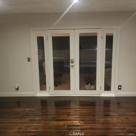 Here is a look at the french doors that lead you into your own private backyard