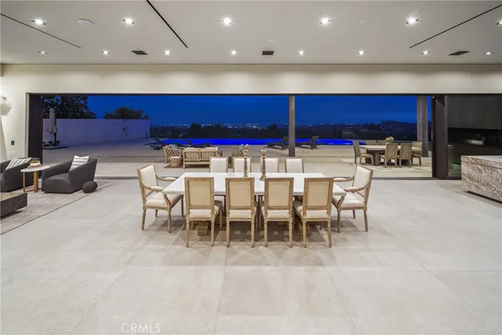 Twilight Picture of Indoor Outdoor Living with a view.