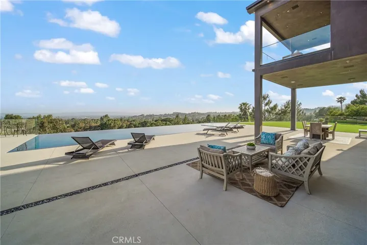 Enjoy the tranquil infinity edge pool while overlooking the city and golf course.