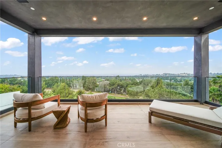 Balcony off of Primary Suite offering city and golf course views.
