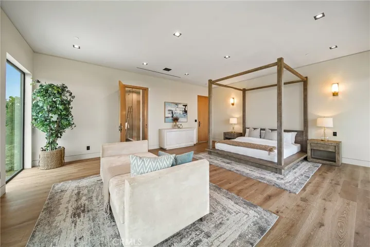 Primary Suite with amazing views and leads to private balcony offering views of the city and golf course.