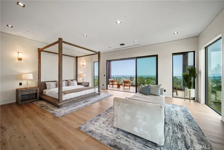 Primary Suite with amazing views and leads to private balcony offering views of the city and golf course.