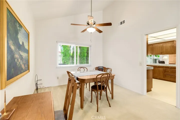 Dining room has pocket door into kitchen