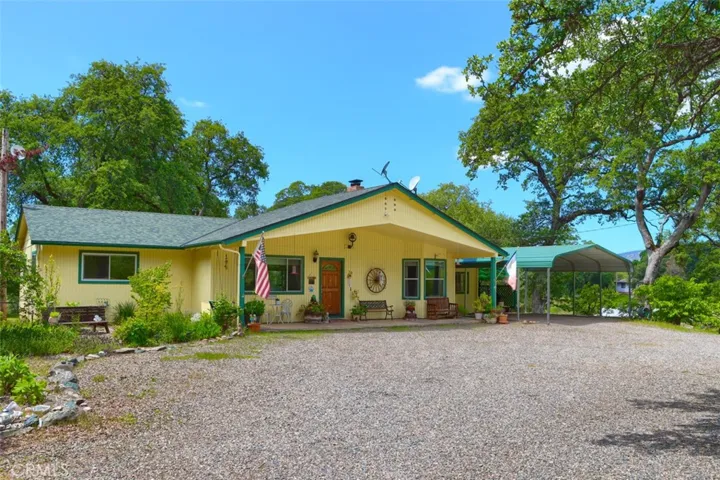 Front Entry w/Covered Porch overlooking Gardens