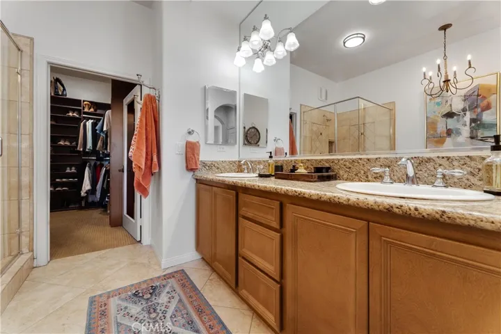 Owners ensuite leads to huge walk-in closet.