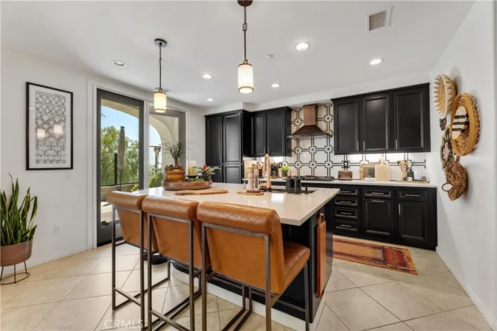 The kitchen island can easily fit 4 stools