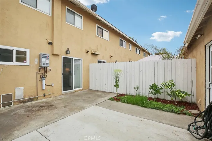 Back Patio View to home entrance through slider