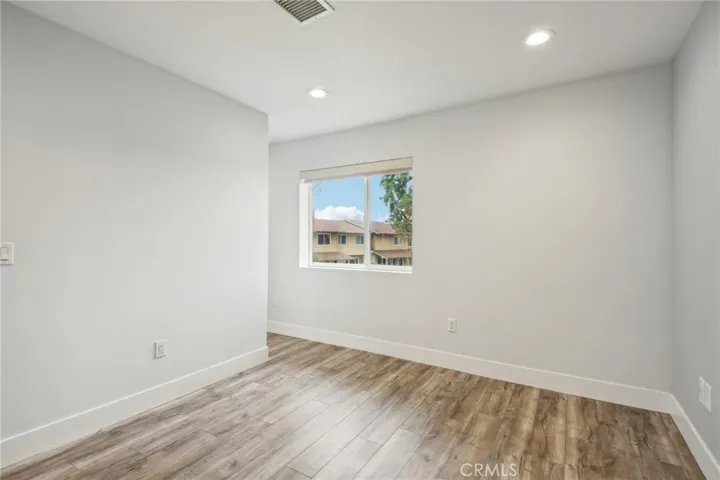 Primary Bedroom going into walk in closet