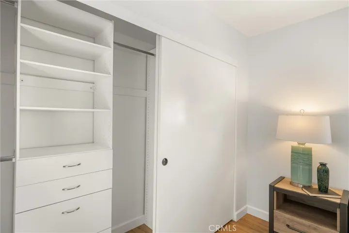built in drawers and shelves in the closet