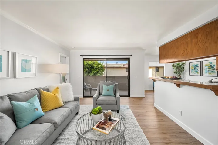 Living room with kitchen to the right.