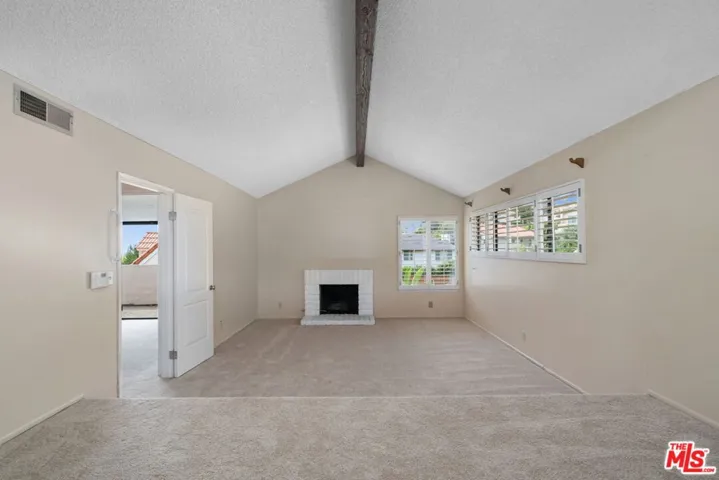 primary retreat with vaulted ceilings