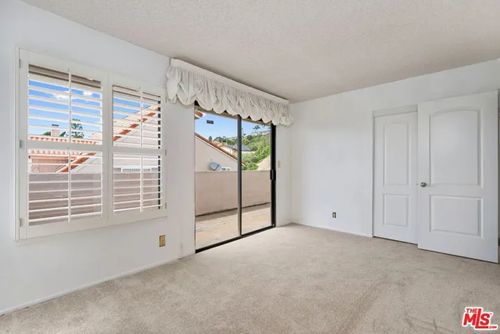 third bedroom with terrace and ocean views