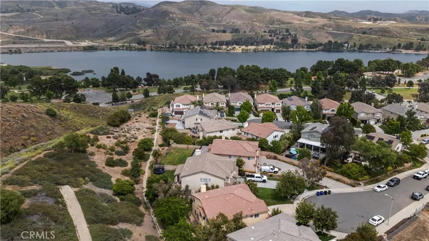 Aerial view of house and lake