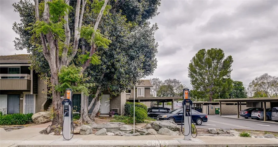 EV charging stations in entrance of tract