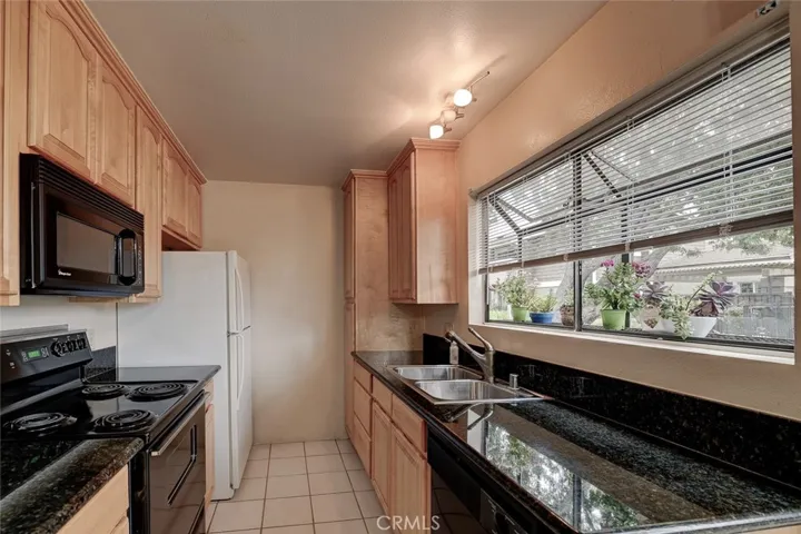 Upgraded granite counter tops w/Maple cabinets