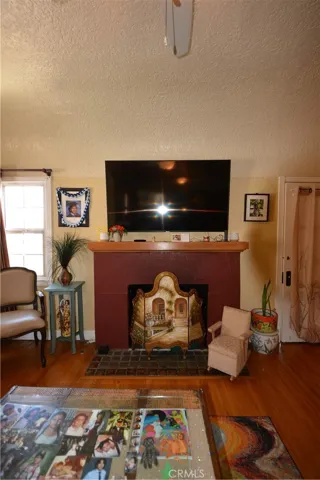 Another view of the cozy fireplace.