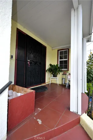 Private front porch or  "Perch" sits above street where you can enjoy private conversation, read or just admire the view