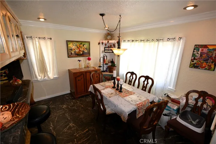 Lovely crown molding in this separate and formal dining room.