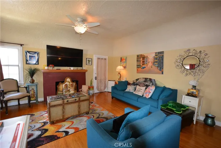Another view of the living room -- gives a glimpse of the 5th bedroom which is private and separated from the other 4.
