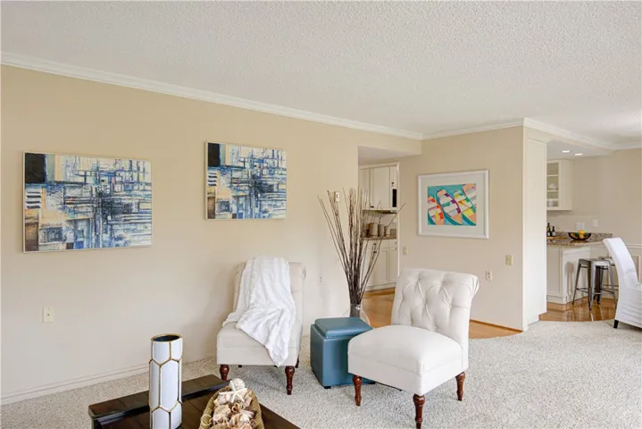 The living room flows into the dining area and kitchen making entertaining effortless.