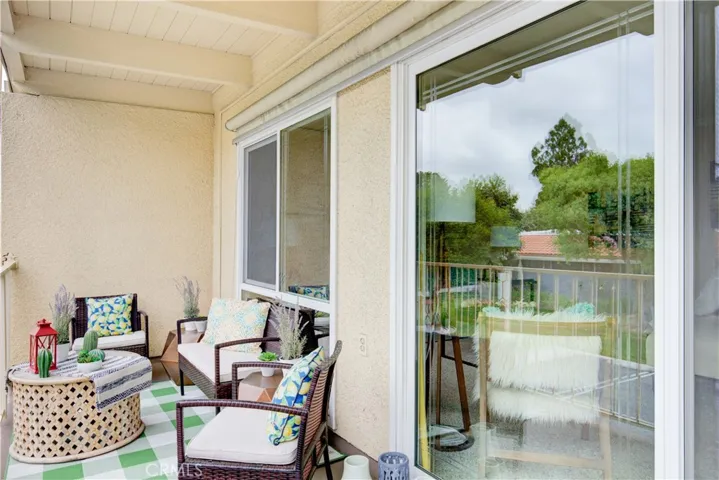 Relax and recharge on your covered balcony.