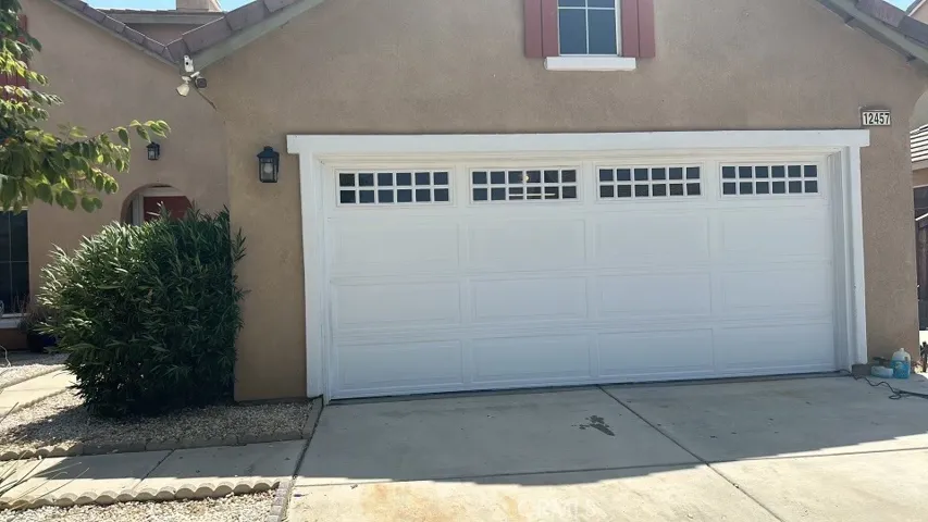 Some new garage door panels and windows. 8-7-24