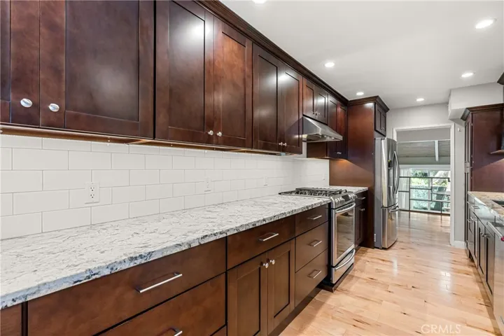Cooks Kitchen with Copious Cabinets
