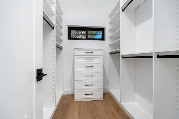 Two custom closets and custom finishes