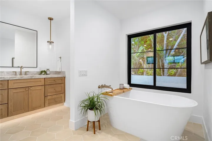 200+ sq ft bathroom with a separate soaking tub