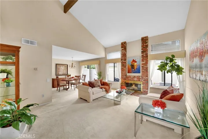 This Popular Floorplan Boats Soaring Ceilings in the main Family Room!