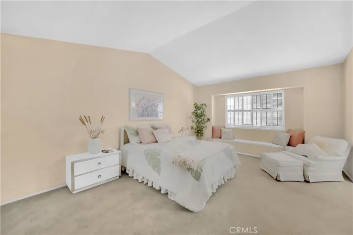 Master includes Cathedral Ceilings, Window Seat, Mirrored Closest and a Sit-Down Vanity in the Bathroom.