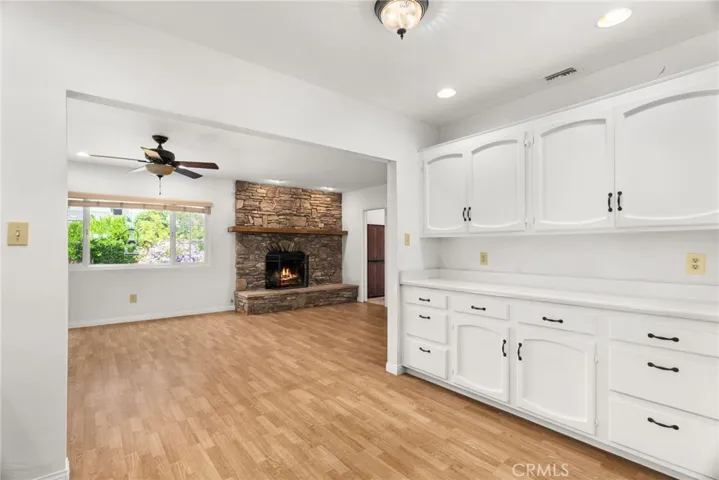Fire in fireplace is virtually created.