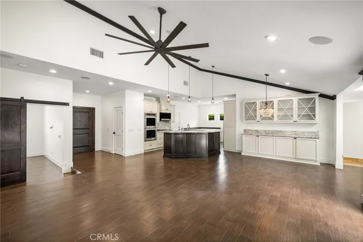 Open Floorplan with Wood-Looking Tile Throughout