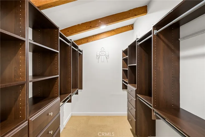Primary Walk-In Closet with Organizers
