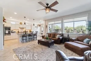 Opens to Kitchen