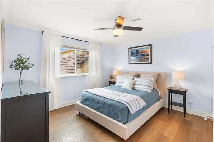 Down the hall on the 2nd floor is the 1st of 2 additional bedrooms. Well appointed with 3 closet doors and plenty of space.