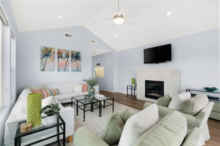 Luxury custom design is noticeable throughout, from the vaulted ceilings, custom fireplace, or the pull down tv wall mount.