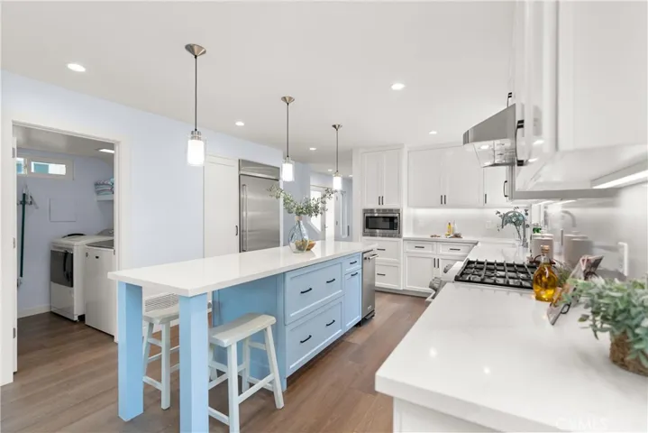 Pantry with sliding shelves - check
Detailed designed cabinetry - check.